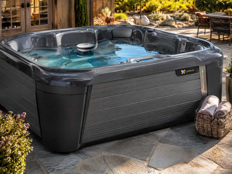 Caldera spa with clear water and a FROG floating dispenser visible
