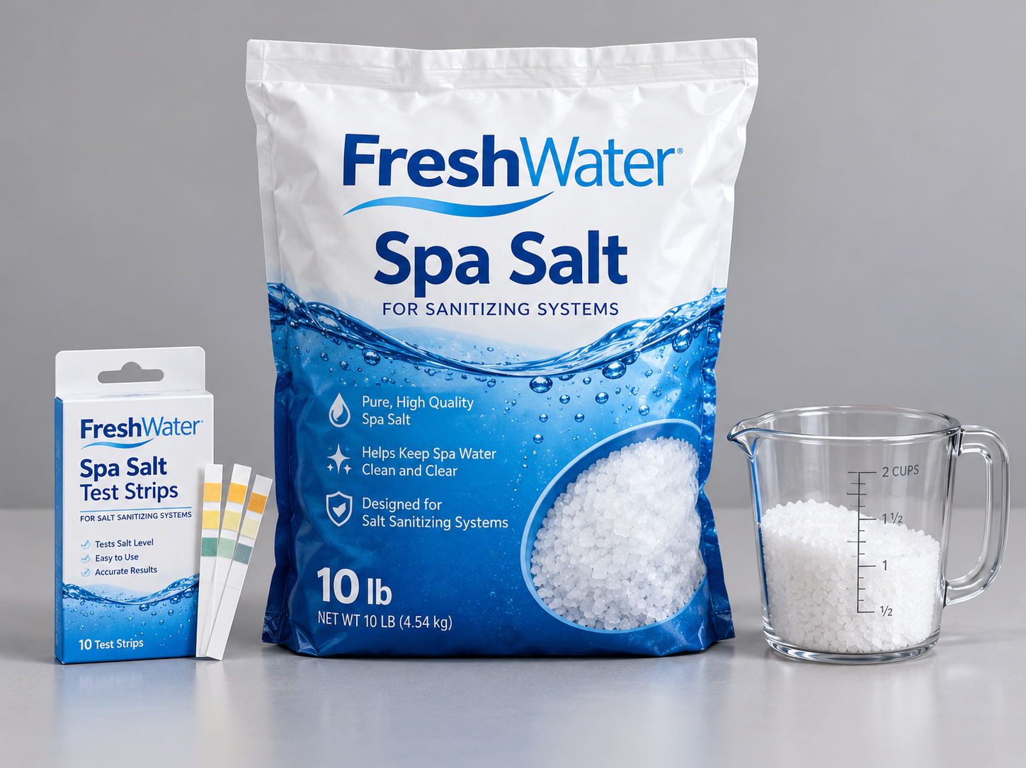 Test strips laid out beside a bag of spa salt and a measuring cup